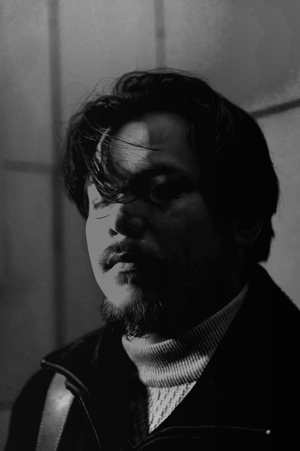 Monochrome Dramatic Male Studio Portrait Prompt for ChatGPT result example